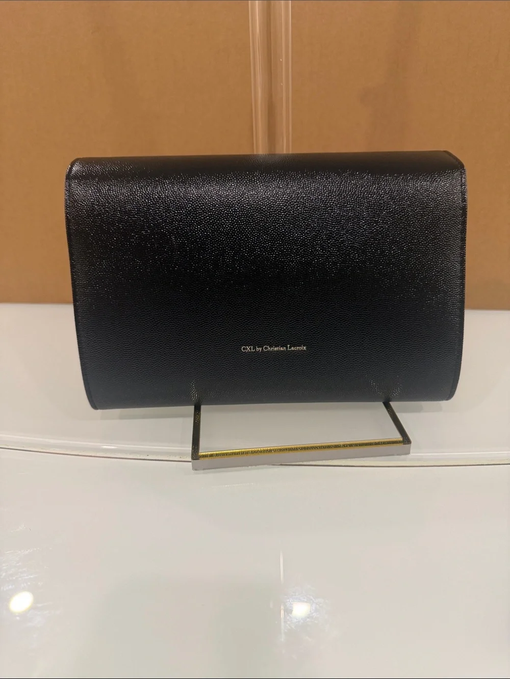 Black Leather Crossbody Bag with Gold Logo Accent